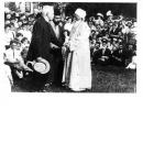 'Abdu'l-Baha Shaking Hands With a Man holding a Straw Boater on the Property of Howard & Mary MacNutt